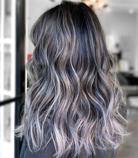 black and silver highlights|black hair with silver highlights.